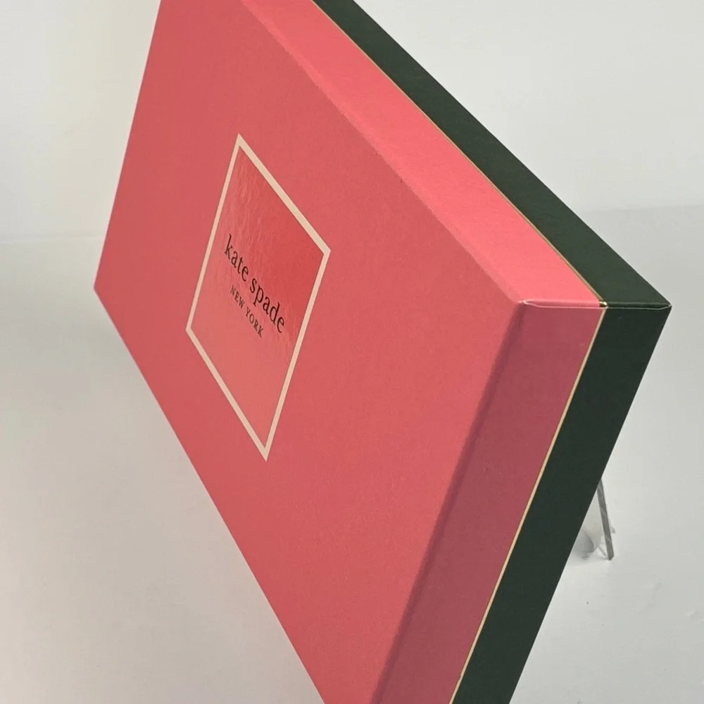 Kate Spade Pink box and green gift bag.